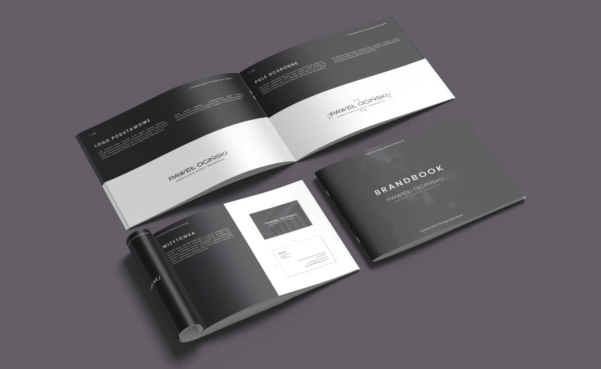 Wydrukowany brandbook kancelarii Paweł Ogiński otwarty na stronie z logo